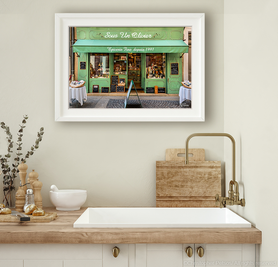 Epicerie with olive green storefront in Isle sur la Sorgue